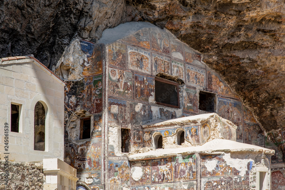 Sumela monastery courtyard under the rock. Remains of old fresco are seen on several walls.Macka, Trabzon, Turkey.